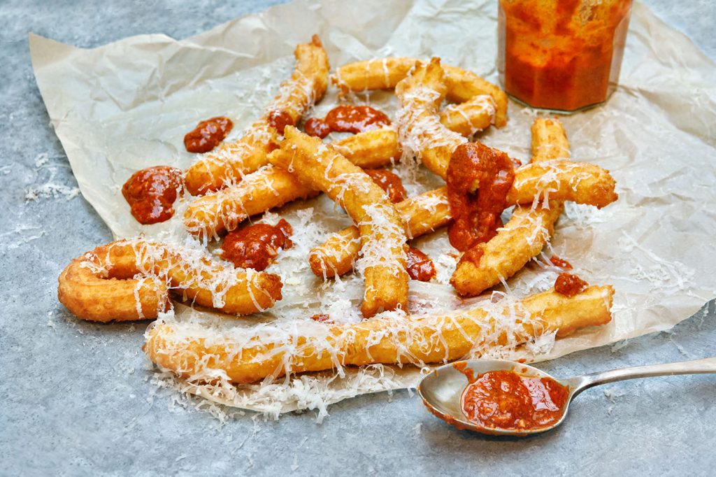 Manchego Cheese Churros with Romesco Sauce